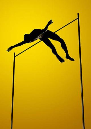 Umělecká fotografie High Jumper above the Pole, artpartner-images,