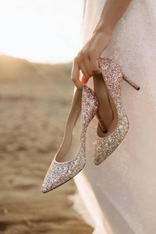 Umělecká fotografie Luxurious high-heeled shoes in the bride's, DAMIENPHOTO,