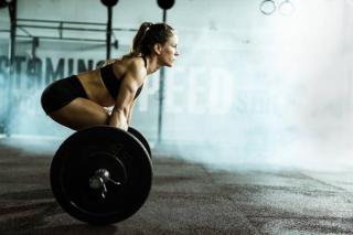 Umělecká fotografie Side view of athletic woman exercising, skynesher,